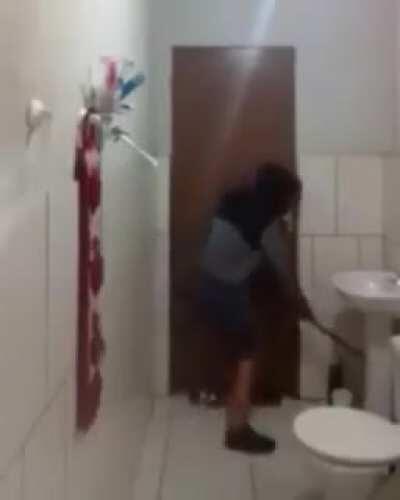 Boy and his cat trying to catch a mouse