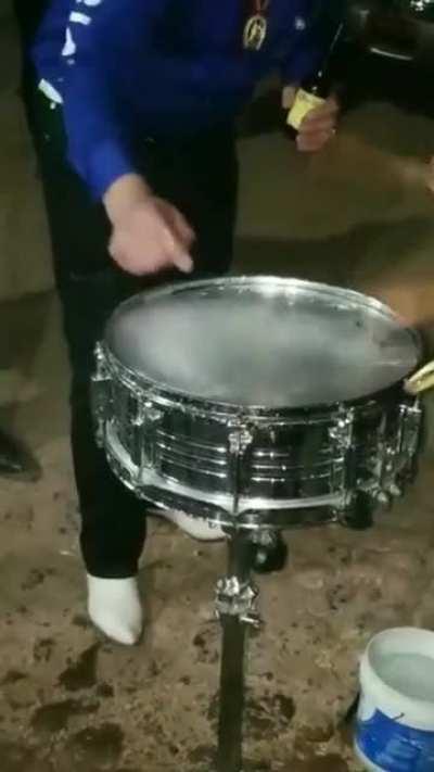 Putting gasoline on drums