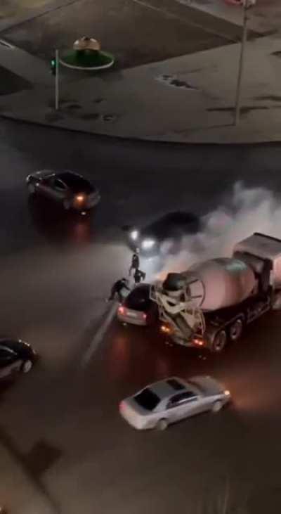 Burning car and helper gets hit