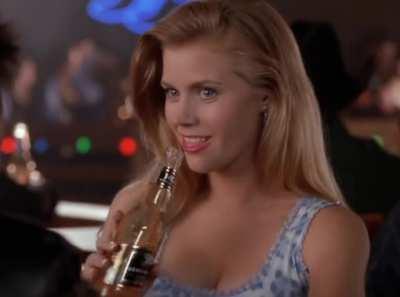 Lois Lane flirting with Lex Luthor to get her exclusive. But she doesn't know that he knows the truth and what's coming to her.( Amy Adams )