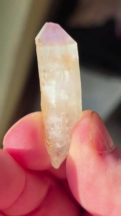 Phantom-terminated amethyst with cubic and natural rainbow inclusions