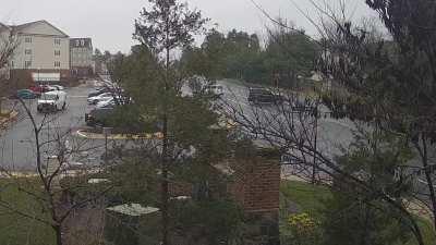 SUV Idiot wrecks head-on after left turn on wet road. Both Drivers taken away in ambulances. Lost control I guess.