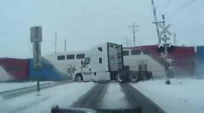 FedEx truck on the train tracks