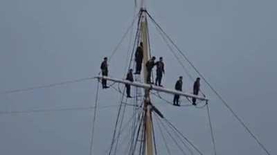 Sailors sing shanties while entering the port