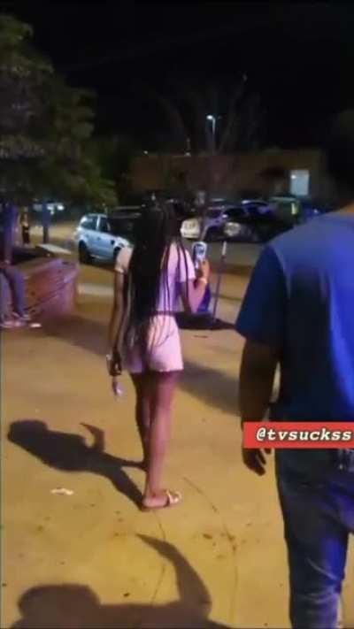 Young teenager threatens to use a firearm while standing next to police officers and refuses to drop it