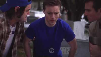 Hannah kissing a guy in the grave yard