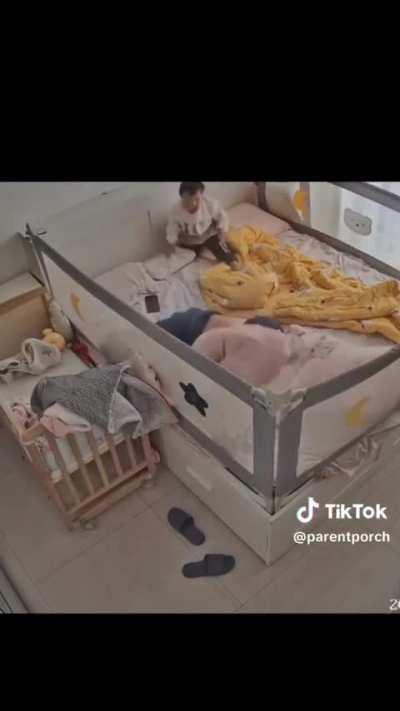 Kid is safe inside the crib