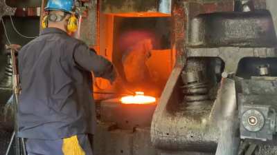Sprocket forging 1045 Carbon steel in a 6000# power hammer