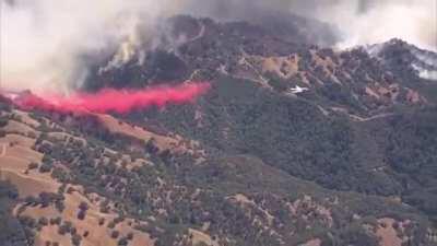 Boeing 747 Global SuperTanker working the LNU Lightning Complex fires near Lake Sonoma California. The Supertanker carries up to 19,600 US gallons (74,000 L) of fire retardant or water.