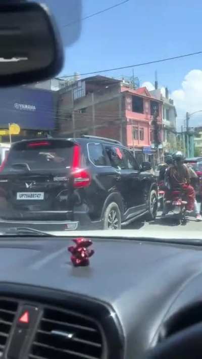 Indians drying their undies in their car window.