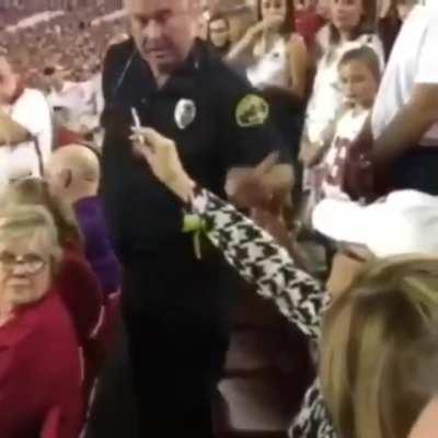 Karen ashing in a cops face.