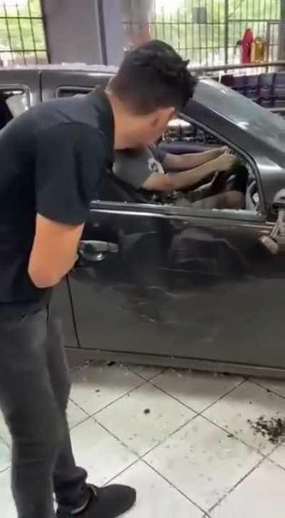 Guy crashes into store and looks totally gone. (Brazil)