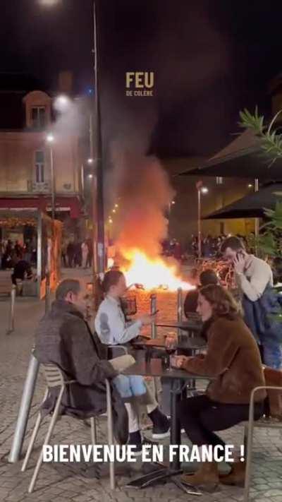 France is living the 'This is fine' meme