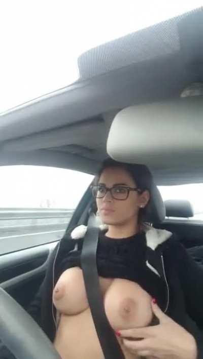 Stunning French Girl Drives with Her Tits Out