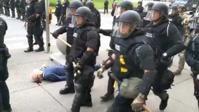 Horrific abuse, police push old man to the ground, he busts his head open and they keep walking