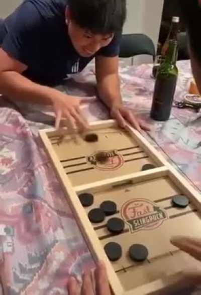 Dexterity game on one side and a strategy game on the other side.