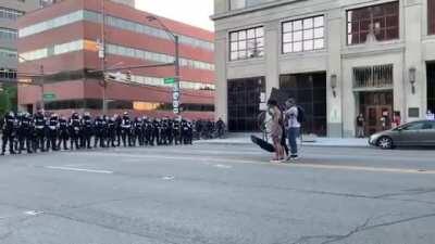 Columbus Police shoot a woman peacefully holding a sign