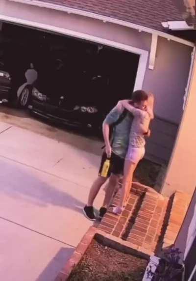 She regularly greets her husband at the door after work.