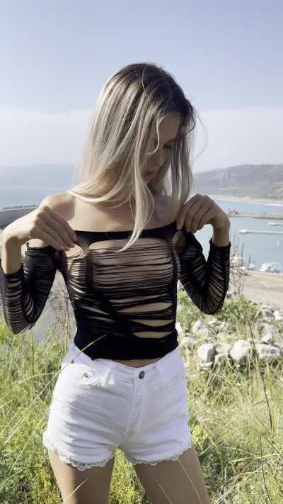 What looks better: white shorts or cute tits