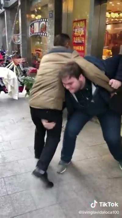 Chinese taxi driver amazed at tall western guy