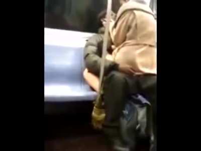 Interracial kissing in the subway