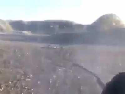 Redneck using a potato as a suppressor.