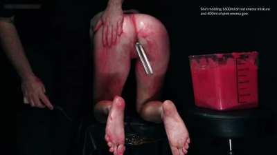 The scene closes with me getting the hooded and inflated Violet off while she's holding almost three litres of red enema mixture and pink enema goo. Sound on Redgifs.