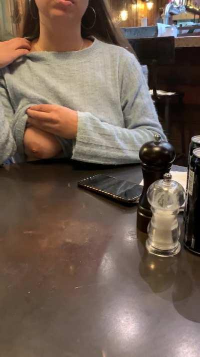 Some shy titties in the restaurant