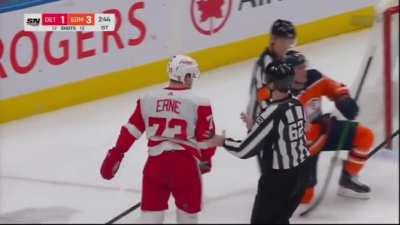 Referee punches Adam Erne in the face