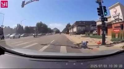 Blowing a red light on a scooter