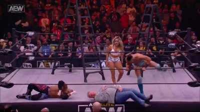 Tay Conti (AEW wrestler) kicks a man in the balls (AEW, April 28, 2022).