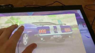 Whatever is happening with this piece of paper I am tracing onto with the computer screen in the background