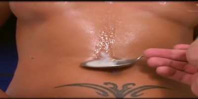 Spoon-fed whore playing with her food