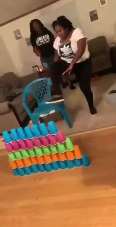 HMC while jumping over wall of cups.