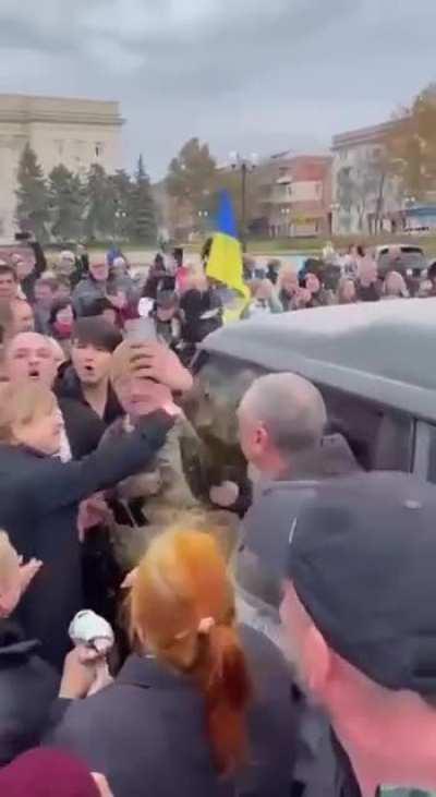Celebrations at the center of Kherson right now. Locals chant ZSU (Ukrainian Armed Forces) and cheer our Warriors. Soldiers report they had to slow down their advance because they are hugged and kissed so much.