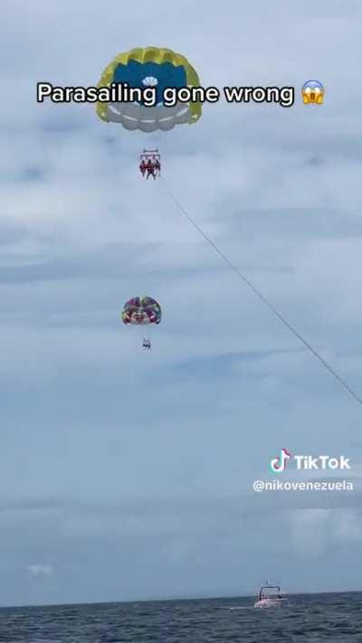 Parasailing cord snaps