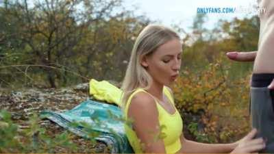 Blonde girl in the forest