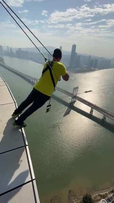 Hanging off Macau Tower