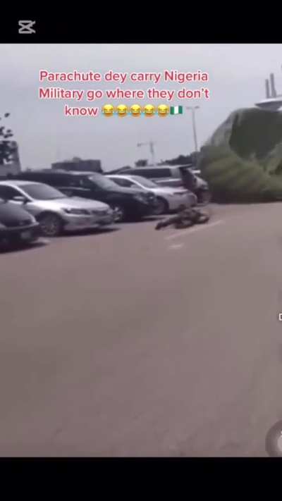 Nigerian parachuters parachute with torn parachutes