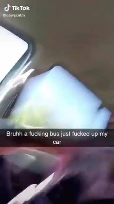 A bus just messed up this dude’s car.