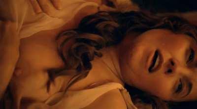 Lucy Lawless (Xena) masturbating with her tit out