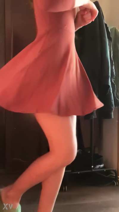 Spinning in a red dress