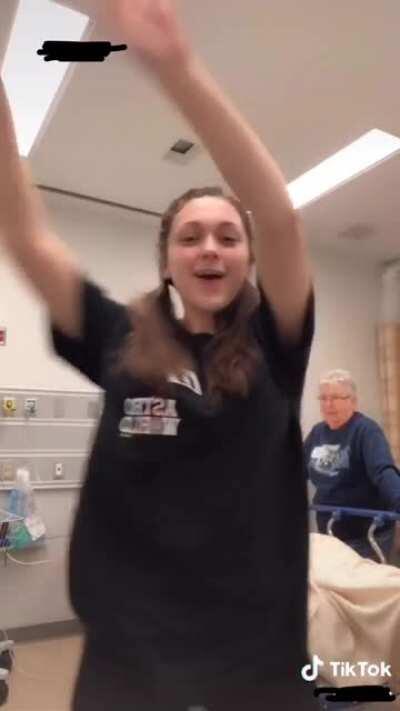 Girl does Tik Tok next to DYING GRANDFATHER