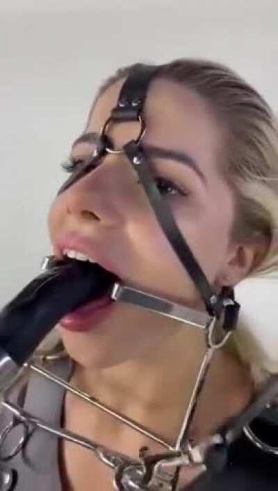 Deepthroating with a Metal Gag