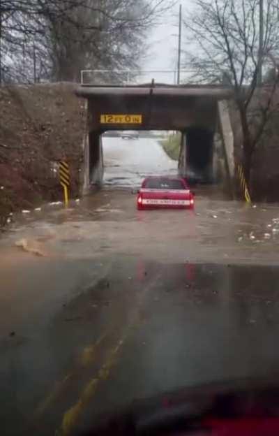 Driving through water under the bridge