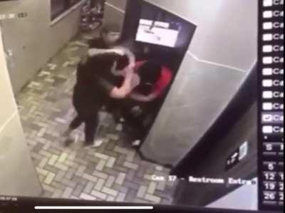 Dude starts flipping on his gf or someone, and then tried to fight a worker, gets dropped
