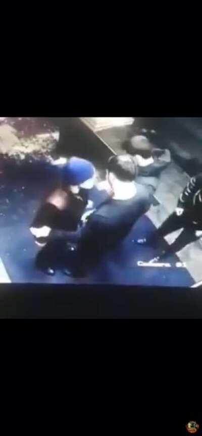 Man pulls knife on bouncer. Bouncer plays it cool.