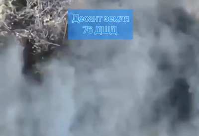 A Russian paratrooper attempts to remove his electric scooter from barbewire, but ends up dragging it over a mine. (Music from source)