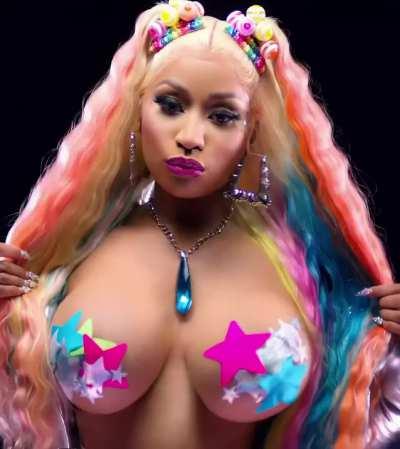 Nicki Minaj teasing her boobs