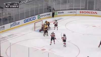 Brad Marchand cross-checks Ty Smith in the head/neck area. No call on the play.